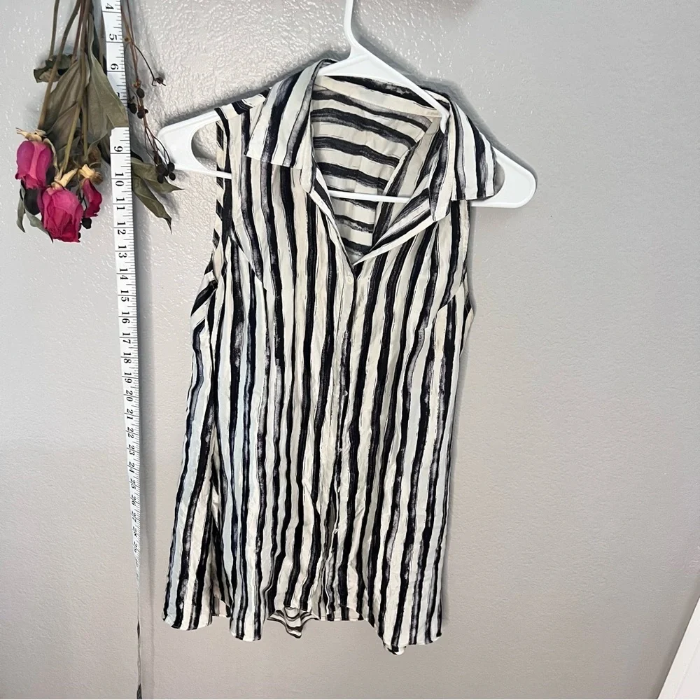 100% silk black|white collared, button-up blouse, size sm-med. short sle…